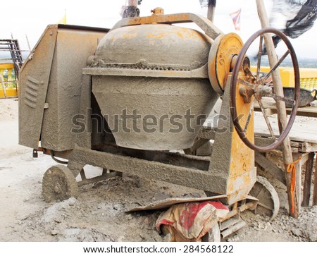 Industrial cement mixer machine at construction site