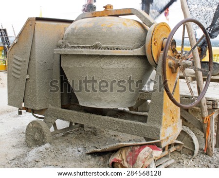 Industrial cement mixer machine at construction site