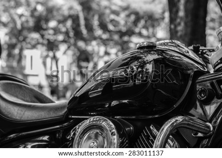 Szeged, Hungary - May 30th, 2015: Photo shoot of Yamaha Drag Star 1100 XVS bike from 2002, closeup shoot of a reservoir and seat. 4-stroke SOHC V-twin engine, 1063cc. Black and white photo.