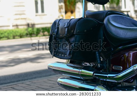 Szeged, Hungary - May 30th, 2015: Photo shoot of Yamaha Drag Star 1100 XVS bike from 2002, closeup shoot of a exhaust and saddlebags. 4-stroke SOHC V-twin engine, 1063cc.