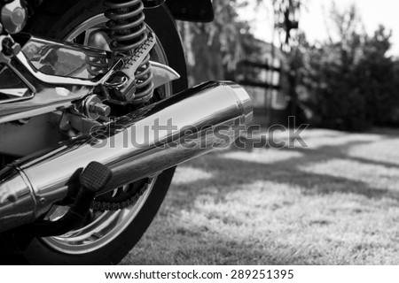 Subotica,Serbia -Jun 13,2015:Photo shoot of Kawasaki ZR 1100 Zephyr A1 bike from 1992, close up shoot of chromed exhaust and chrome parts.1062cc.Black and white photo.Selective focus.