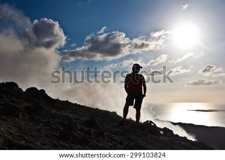 Backpackers silhouette - Volcano, Lipari Islands, Italy