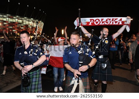 WARSAW, POLAND - OCTOBER 14, 2014: EURO 201 Football Cup Qualifiers Scotland vs Scotland
o/p: polish and scotish football fans