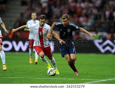 WARSAW, POLAND - OCTOBER 14, 2014: EURO 201 Football Cup Qualifiers Scotland vs Scotland\
o/p: Grzegorz Krychowiak James Morrison