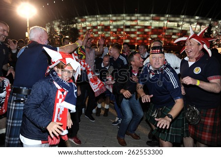 WARSAW, POLAND - OCTOBER 14, 2014: EURO 201 Football Cup Qualifiers Scotland vs Scotland\
o/p: polish and scotish football fans