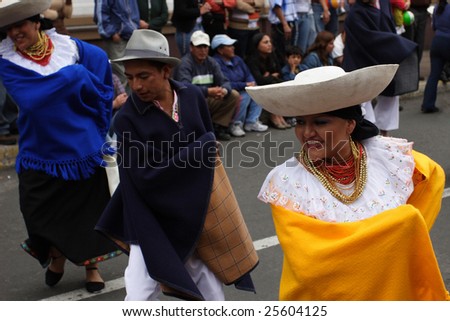 RIOBAMBA, ECUADOR - JANUARY 14, 2008:  Native people performs dances on annual carnival on the main street of Riobamba January 14, 2008 in Riobamba, Ecuador