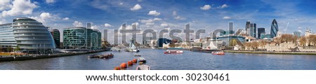 Panoramic picture of City of London with lots of tourists (including City Hall, Gherkin, Tower 42, and HMS Belfast).