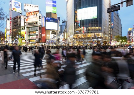 Tokyo, Japan - January 17, 2016: Evening rush hour at the famous Shibuya Crossing in Tokyo, Japan. This area is known as one of the fashion centers of Japan.