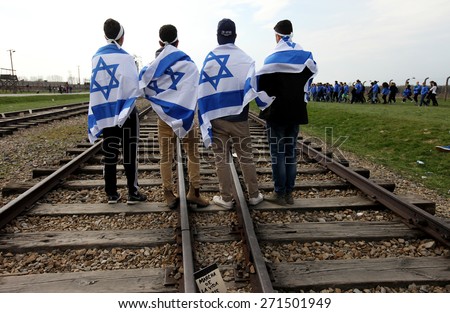 OSWIECIM, POLAND - APRIL 16, 2015: Holocaust Remembrance Day next generation of people from the all the world meets on the March of the Living in German death camp in Auschwitz Birkenau, in  Poland