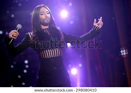 KIELCE, POLAND - JUNE 27: Austrian cross-dressing diva Conchita Wurst  sings at a concert in Kiellce, Poland on Saturday June 27 , 2015 on February 12, 2015 in Sanremo, Italy.