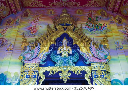 A mural painting in native thai fine art on the wall and ceiling of Buddhist temple Chiang Rai,Thailand