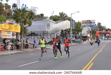 Los Angeles, CA, USA - March 15, 2015: LA Marathon: Elite Men on Sunset Blvd in front of Mel\'s Diner. 1st Place Winner - Daniel Limo, 2nd - Lani Rutto, 4th - Edwin Koech.