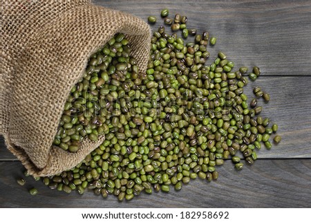 Raw mung beans in canvas sack
