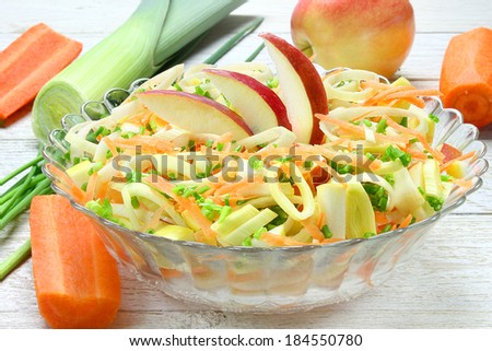 Salad with leek, carrots and apples