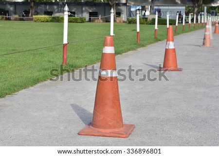 traffic cones to prevent a driver not to drive off the safety zone.