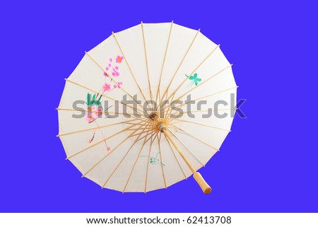 Chinese umbrella isolated on blue background.