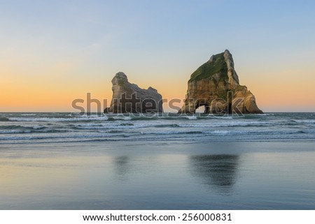 Archway Islands at the Wharariki Beach, New Zealand\'s South Island.
