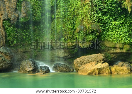 Mountain and Flowing Water drops in stone