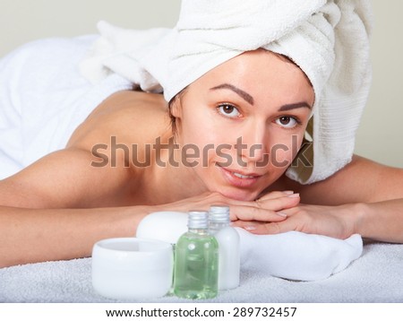 Closeup portrait of attractive gentle female enjoying day spa in luxury beauty salon, alternative medicine, harmony and inner peace concept