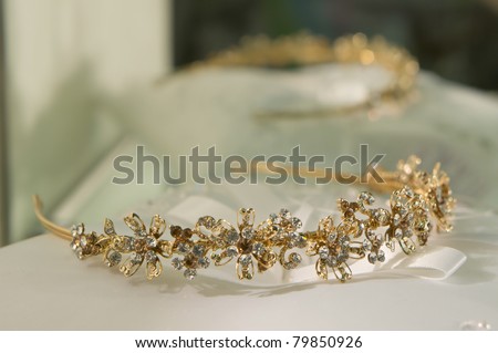 stock photo gold wedding tiara on a pillow