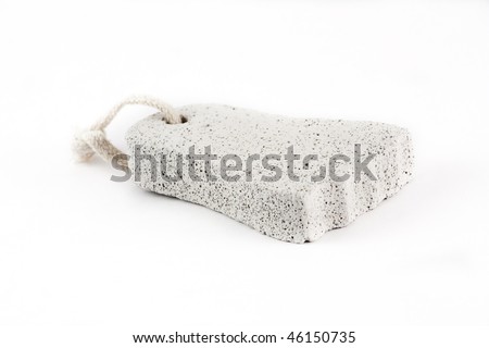 A foot shaped scrub tool, isolated on white