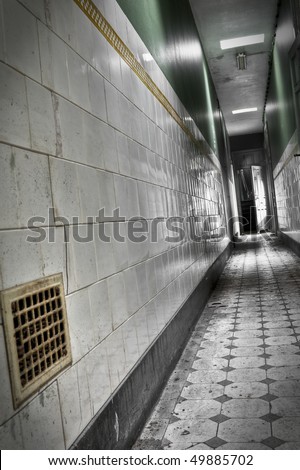 A Hallway at an abandoned building, vintage floor and walls, time stood still at this place.