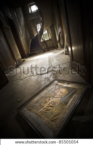 An illustration of a religious person laying broken on the floor at this creepy scenery.