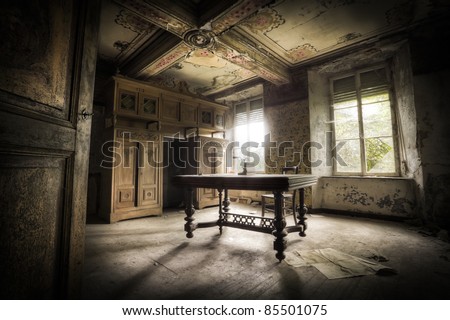 A creepy scenery, this old table creating a moody atmosphere along with the magnificent light.