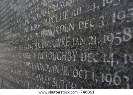 memorial closeup with names of deceased engraved