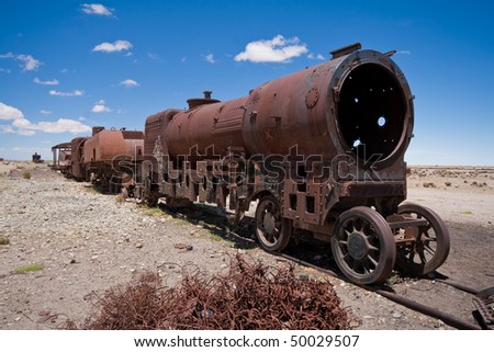 Rusty old steam train in Bolivian desert near Uyuni