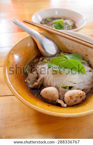 Thai noodle soup (Kuay Tiew Ruer). Serve with Basil. This kind of food is very simple food as you can easy looking for every where in Thailand cost just 1-2 us dollars & very delicious.