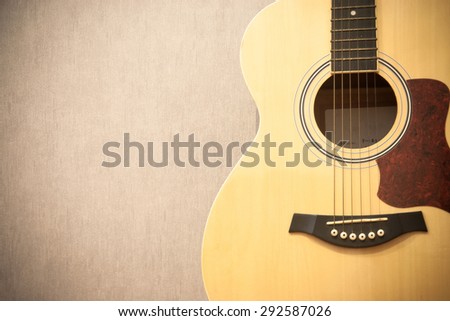 Close up guitar with copy space on gray background - vintage effect