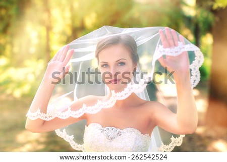 Portrait of the bride -bride in an expensive wedding dress.Attractive girl.Beautiful bride.
Portrait of the bride with big eyes