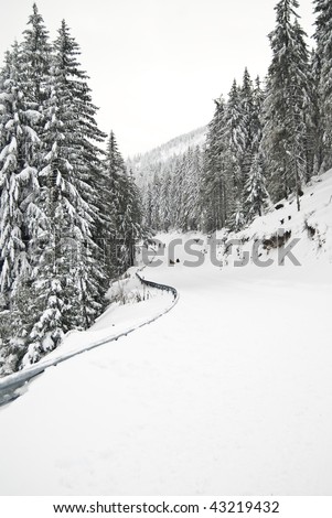 Snow covered road in a mountain resort in Romania