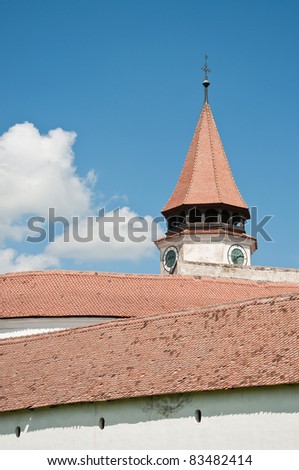 Fortified church of Harman in Romania. Tall white wall of a small fortified church in Transylvania