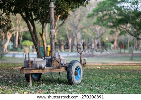 Old plant watering trolley