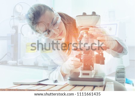 Research scientist is using microscope in laboratory room., Science, chemistry, technology, biology., Double exposure concept.
