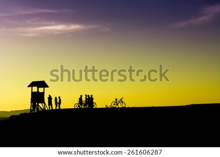 Outdoor mountain bike - cyclists silhouettes on the background.