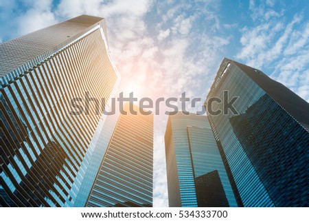 Business downtown and skyscrapers, high-rise buildings, modern architecture.