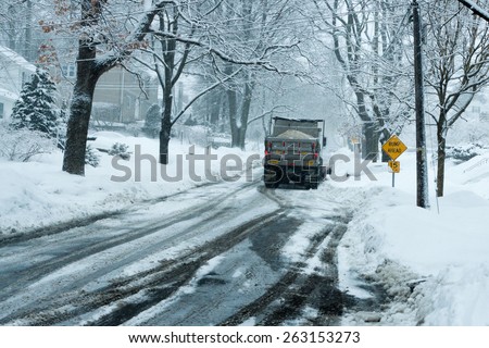 Stamford, CT, USA - March 5, 2015: Daylight street scene during a snow storm in Stamford Connecticut on March 15th, 2015