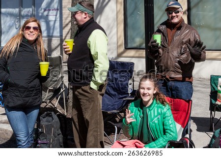 Greenwich, CT, USA - March 22nd, 2015: Spectators enjoying the  