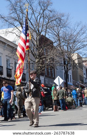 Greenwich, CT, USA - March 22, 2015: People watching and enjoying the annual 