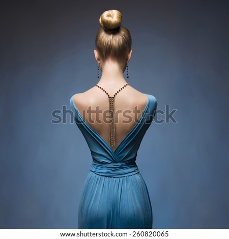 Fashionable Sexy blond girl.Beauitiful young woman in blue dress.Accessories