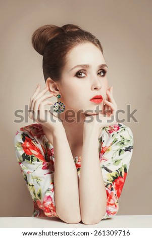 fashion portrait of beauty young woman.flowers dress of beautiful spring girl