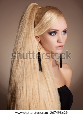 fashion portrait of beautiful blond young woman. girl with Long healthy hair