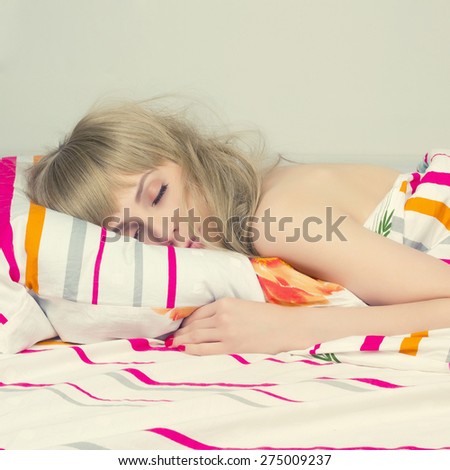 beautiful sleeping girl in the bed. beauty woman in the morning.wake-up