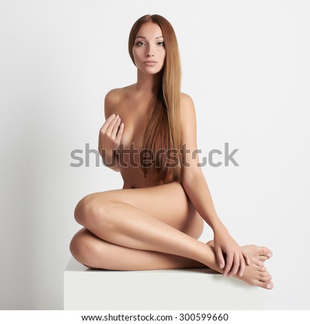 image.shutterstock.com/display_pic_with_logo/2978116/300599660/stock-photo-nude-beautiful-young-woman-sexy-girl-sits-like-a-mermaid-with-long-hair-300599660.jpg