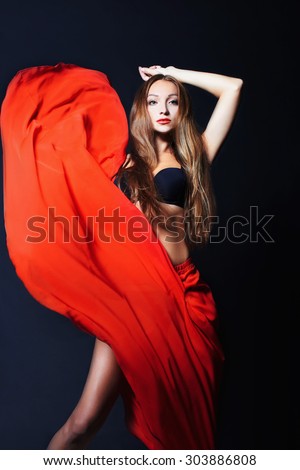 dancing beautiful girl. beauty sexy young woman in dynamics.flamenco dance