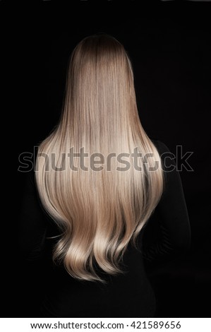beautiful blonde wonderful hair.back of girl with Blond Hair over back background