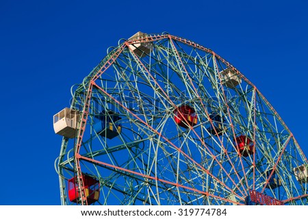 Wonder Wheel in Coney Island against blue cloudless sky. Photographed in September 2015.